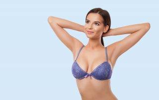 mummy makeover woman after a hybrid breast augmentation cost procedure